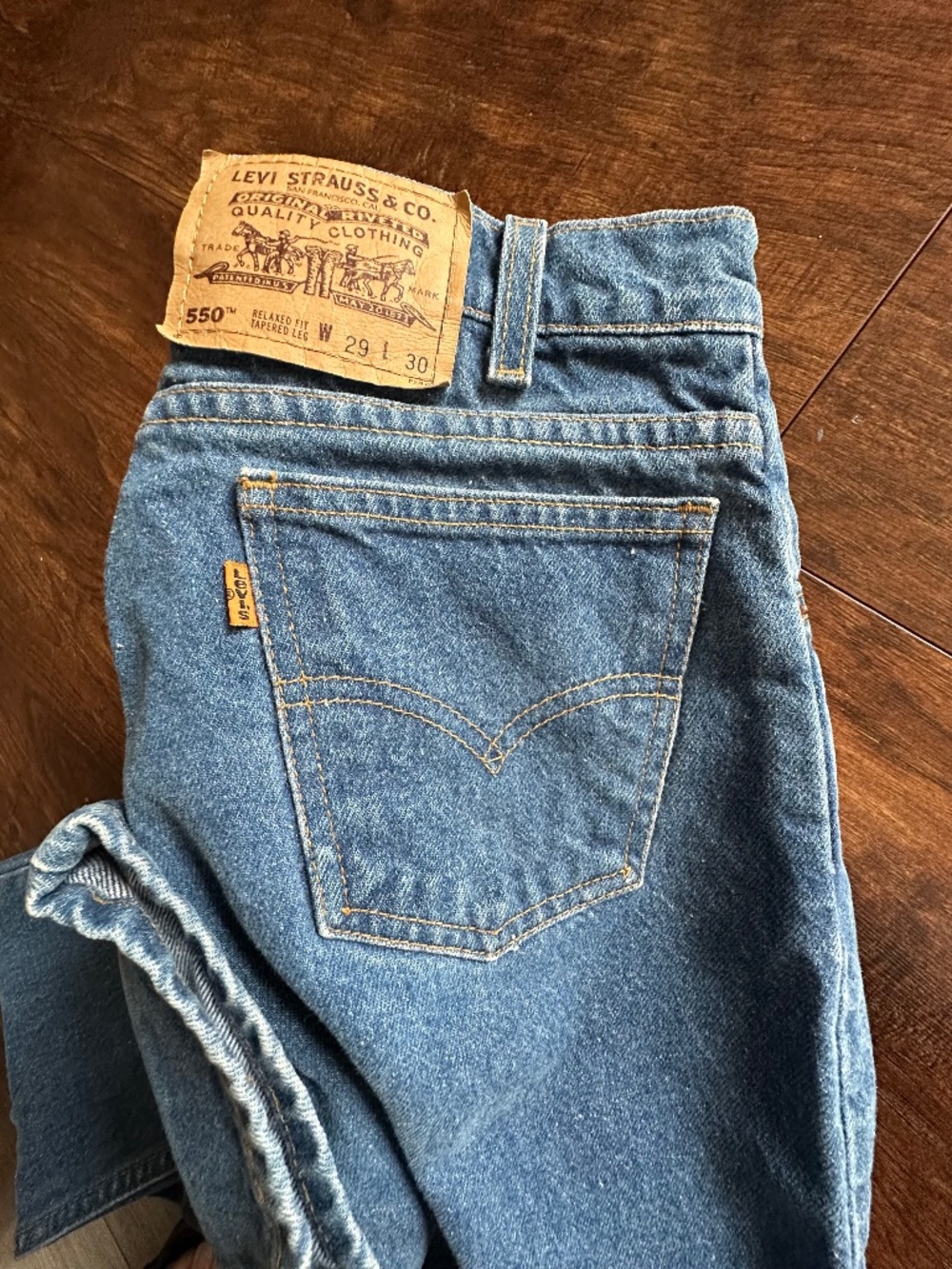 Vintage 90s Levis 550 29x30 Tapered Leg Orange Tab Jeans